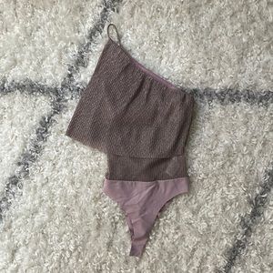 Cute sparkly bodysuit. Never worn.